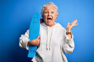 Woman holding skateboard