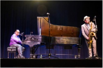 Musicians playing instruments on stage