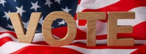 Vote The word Vote in front of an American flag