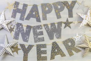 Happy New Year72 Silver letters spelling out Happy New Year