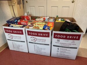 food drive boxes filled with food