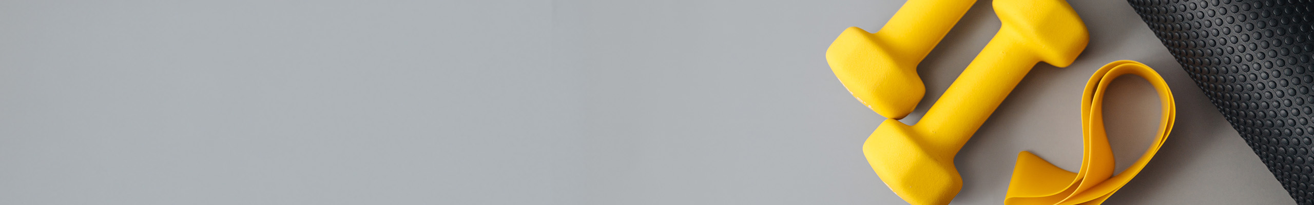 exercise equipment on gray background